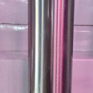 A metal pole with pink and silver stripes on it.