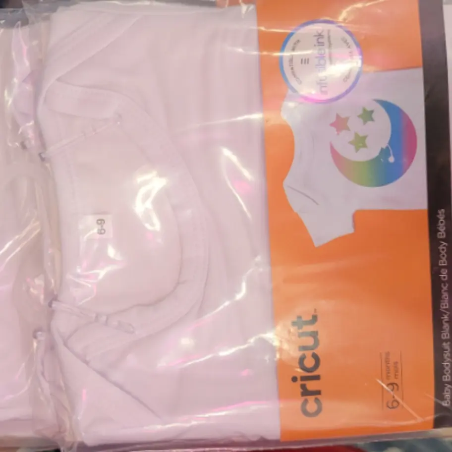 A package of baby clothes in the packaging.